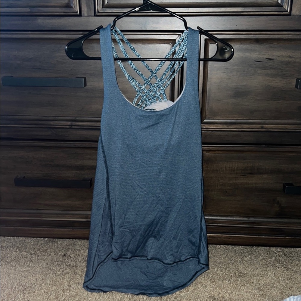 Lululemon tank top size 4 with built-in bra and low back.
